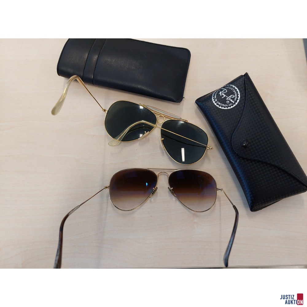 2 Sonnenbrillen der Marke Ray Ban je in einem Etui