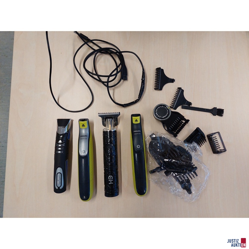 Diverse elektrische Rasierer der Marken Philips