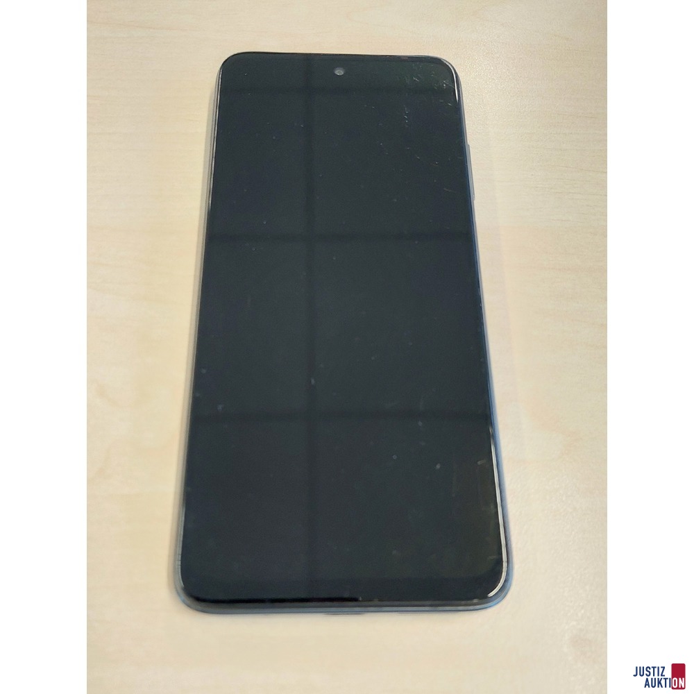 Handy der Marke Redmi Model&colon; 21061119DG