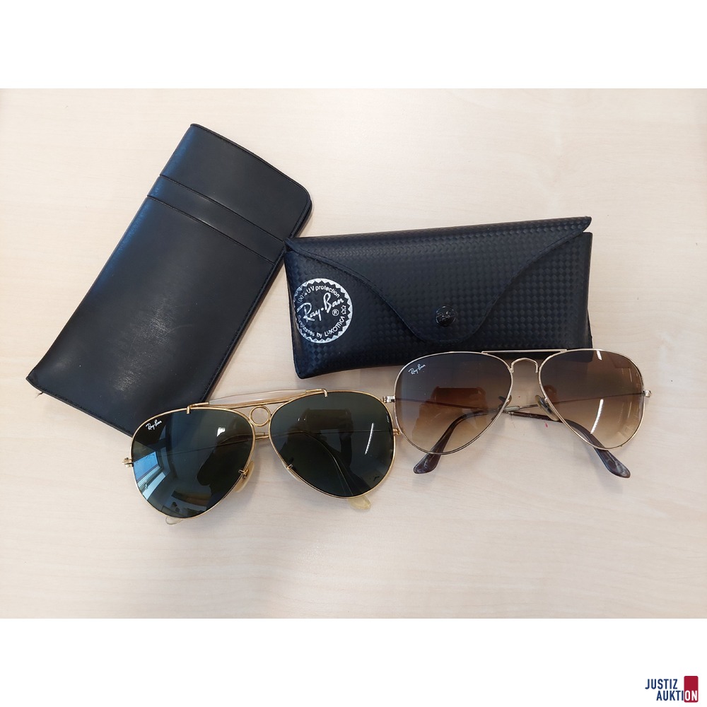 2 Sonnenbrillen der Marke Ray Ban je in einem Etui