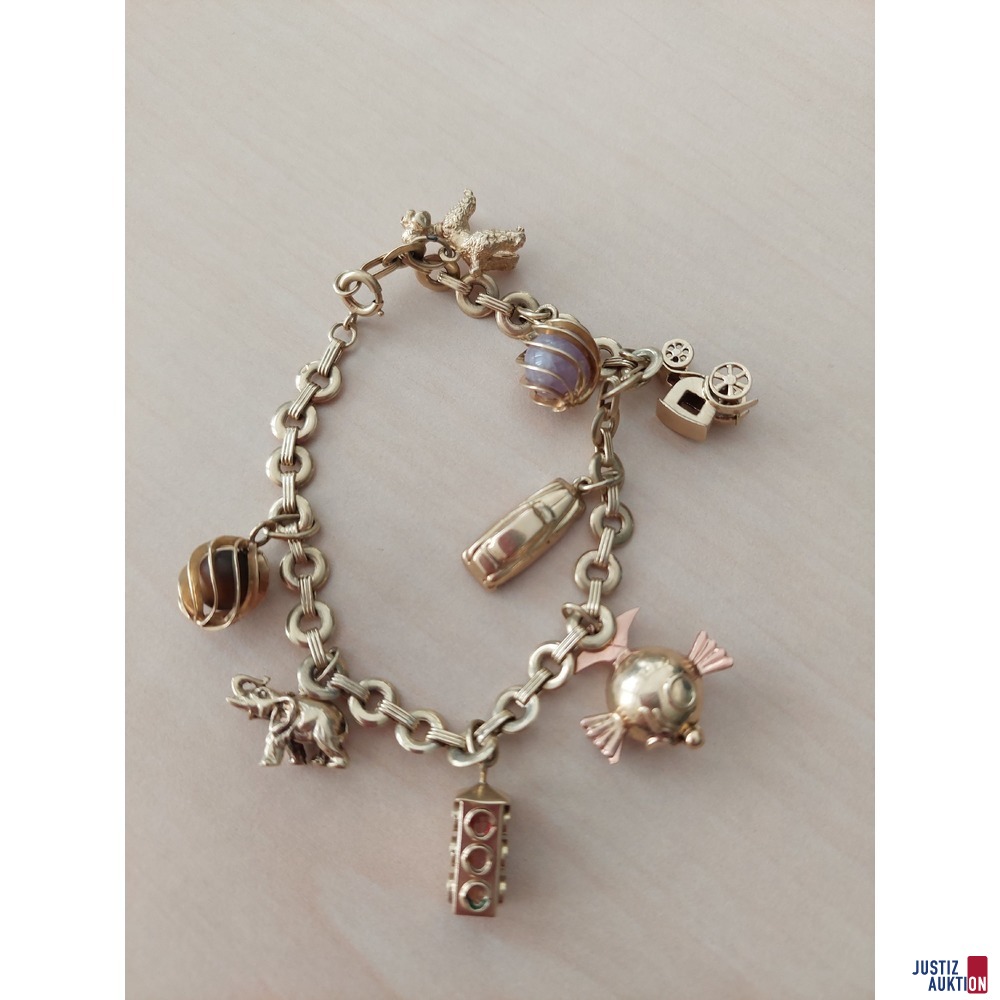 Bettelarmband mit diversen Anhängern 585 Gelbgold punziert Gewicht 30,3 g Metallwert: € 920,00