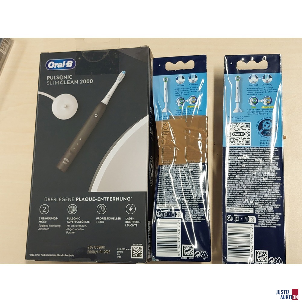 1 elektrische Zahnbürste der Marke Oral-B u.a.