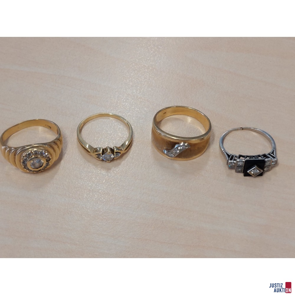 4 Stück Damenringe 585 ‰ Gold punziert mit Schmucksteinen