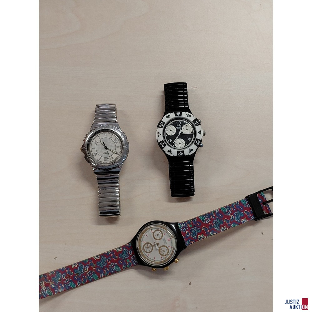 Konvolut bestehend aus drei Herrenarmbanduhren Marke Swatch