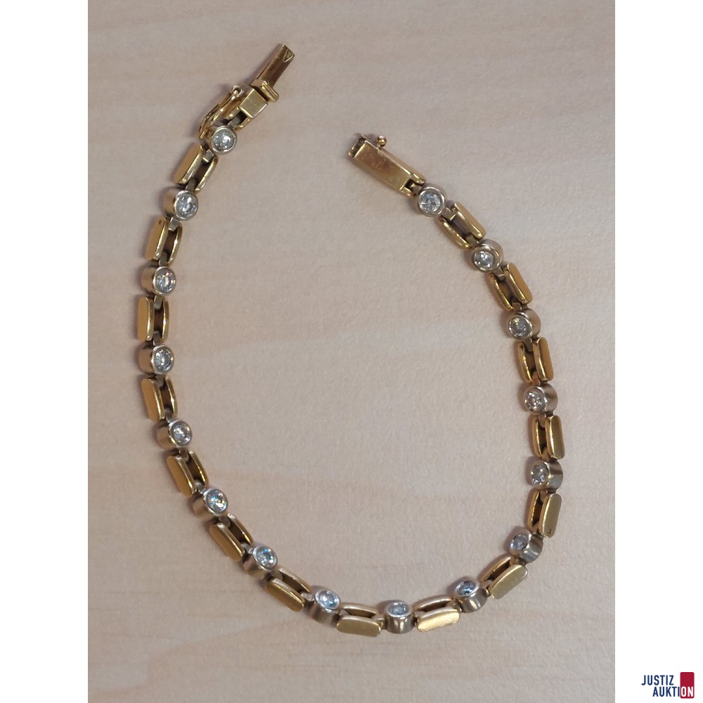 Armband Gelb&sol;Wei&szlig;gold gemischt 750 &permil; punziert&comma; 16 Brillianten 0&comma;16 ct gesamt zirka 2&comma;5 ct&comma; mittlerer Farb&comma; niederer Reinheitsgrad&comma; L&auml;nge 20 cm&comma; 19&comma;2 g