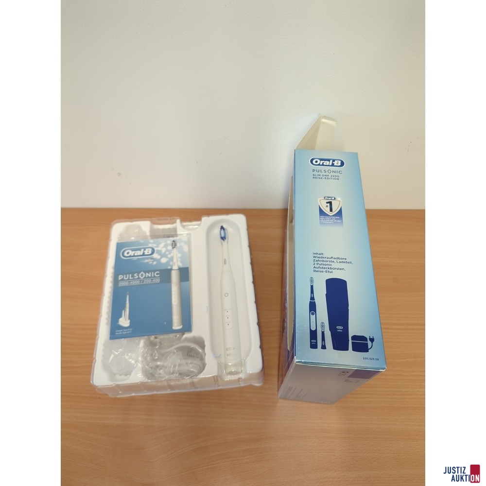 eleltrische Zahnbürste mit Verpackung, inklusive Zubehör