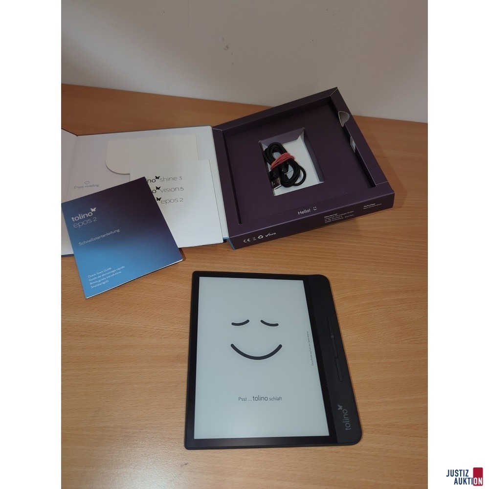 Reader und offene Verpackung mit Zubehör