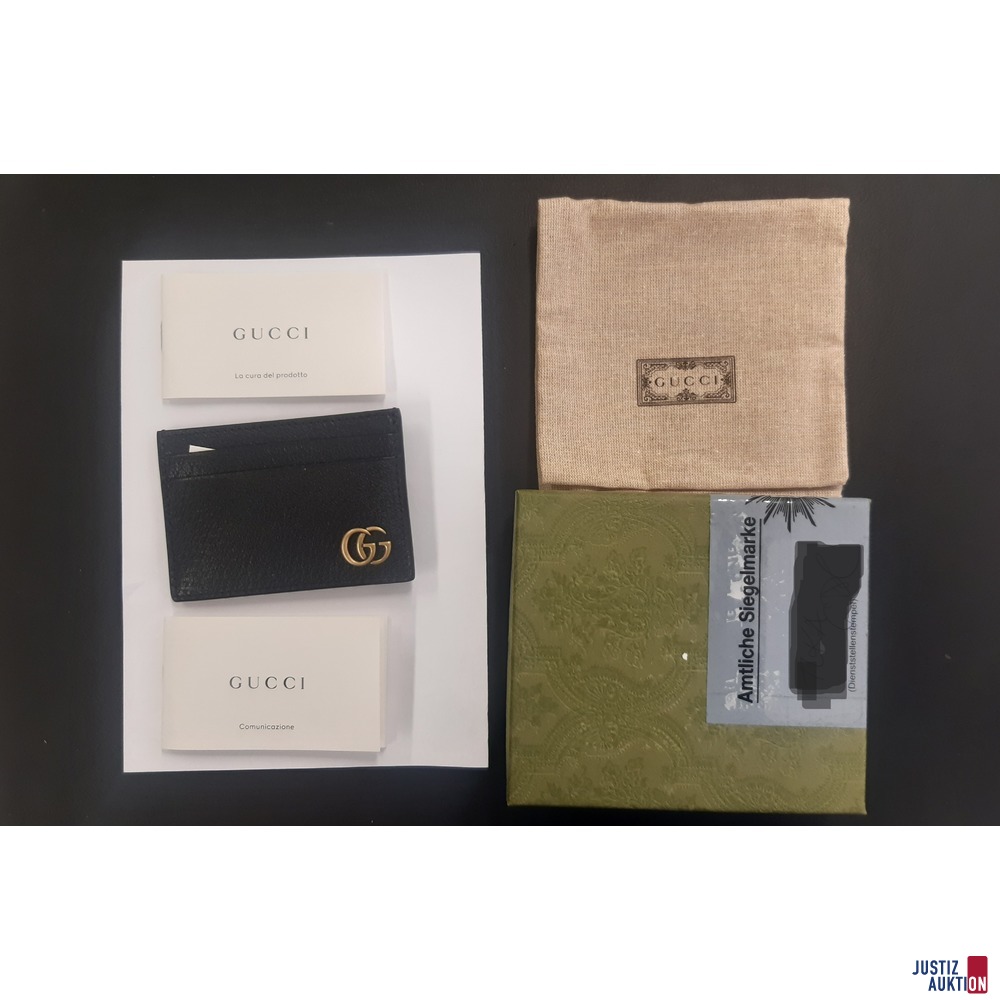 Etui mit Verpackung und Zubehör