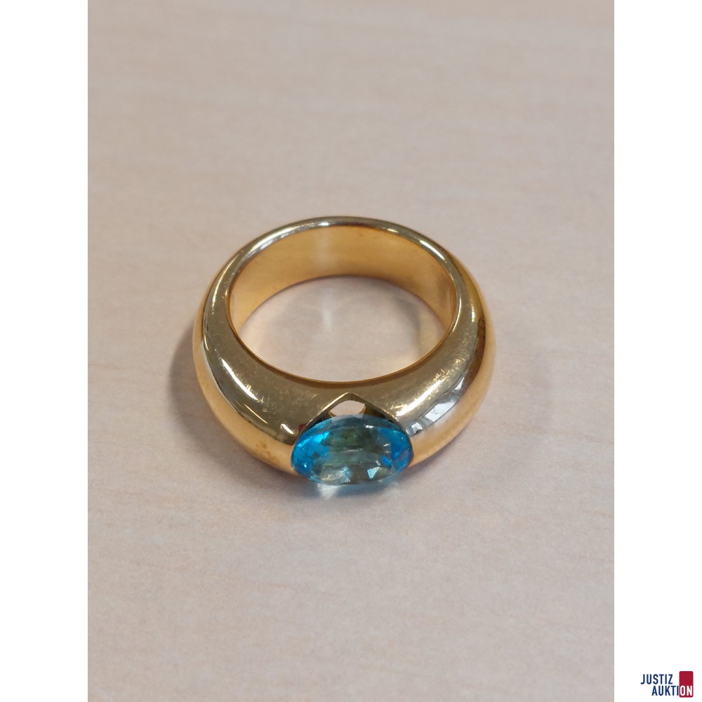 Damenring mit hellblauem Topas 750&permil; punziert