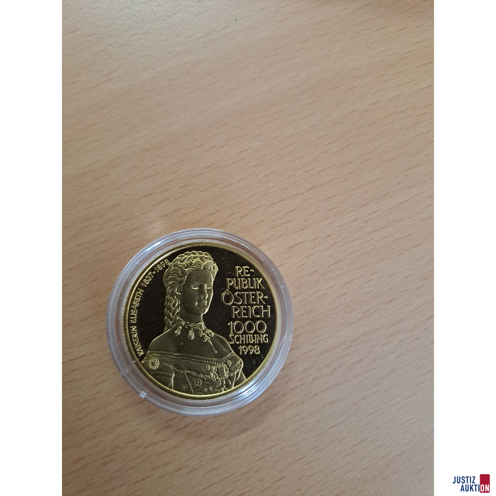 M&uuml;nze goldfarbenen Aufschrift 1000 Schilling 1998