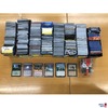 Box mit diversen Sammelkarten „MAGIC The Gathering“