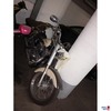 2 Bilder der Harley von vorne bzw. von der Seite.