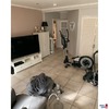 Fitnessgeräte, Fernseher, Sideboard