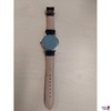 Herrenarmbanduhr der Marke ES getragen
