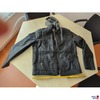 Jacke liegend mit Zollstock