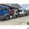 MAN LKW mit weiterem LKW