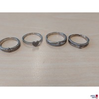 Konvolut bestehend aus 4 Silberringen 925 ‰ punziert
