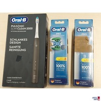 1 elektrische Zahnbürste der Marke Oral-B u.a.