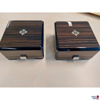 2 leere Uhrenschatullen mit der Aufschrift Patek Philipp Geneve