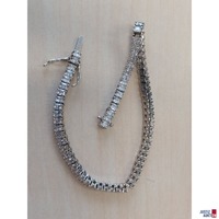 Wei&szlig;goldfarbenes Tennisarmband mit wei&szlig;en Schmuckstein